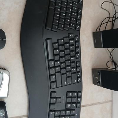 Sony Walkman with case, Insigna Computer speakers, Del Ton ergonomic wireless Keyboard and wireless Arteck mouse