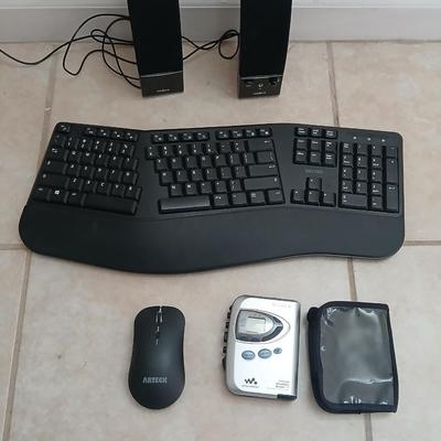 Sony Walkman with case, Insigna Computer speakers, Del Ton ergonomic wireless Keyboard and wireless Arteck mouse