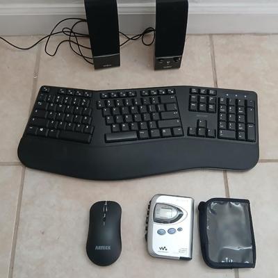 Sony Walkman with case, Insigna Computer speakers, Del Ton ergonomic wireless Keyboard and wireless Arteck mouse
