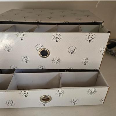 Light bulb storage box with Two extension cords and a blacklight flash light