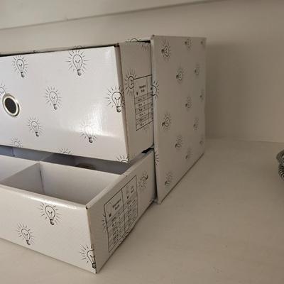 Light bulb storage box with Two extension cords and a blacklight flash light