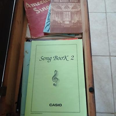 Piano Bench full of music books