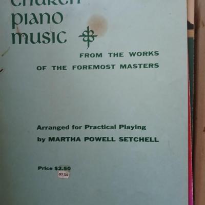 Piano Bench full of music books