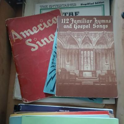 Piano Bench full of music books
