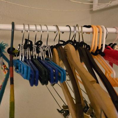 Portable Clothes Rack on casters with an assortment of Hangers