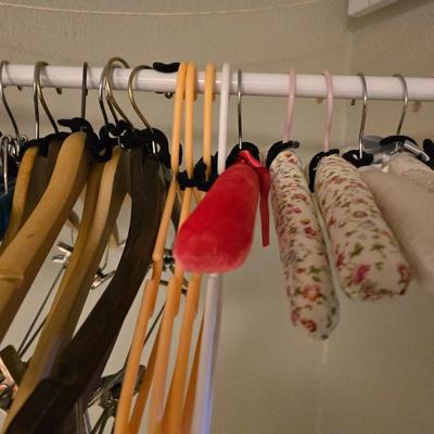 Portable Clothes Rack on casters with an assortment of Hangers