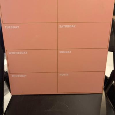 Pink schedule board