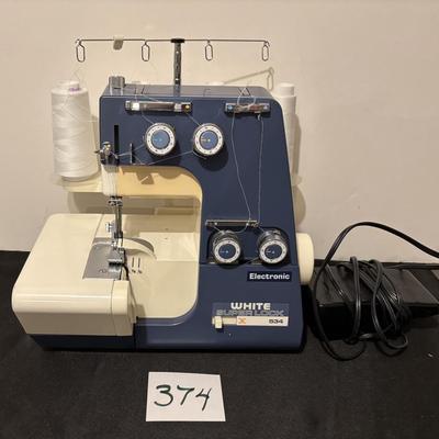 White Super Lock 534 Surging Sewing Machine