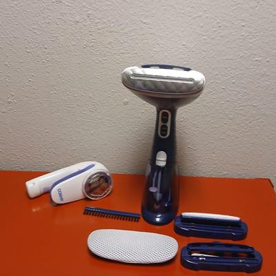 Conair Corporation turbo extreme steam handheld clothes steamer and a Conair fabric shaver