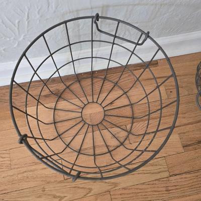 Two vintage metal baskets