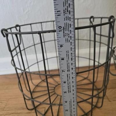Two vintage metal baskets