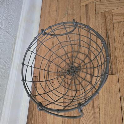 Two vintage metal baskets