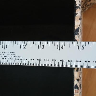 Two matching nesting fabric covered storage boxes with handles