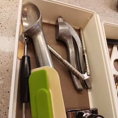 A VARIETY OF KITCHEN UTENSILS