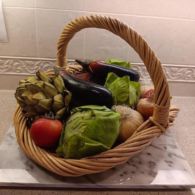 REALISTIC VEGETABLES IN A BASKET AND A GRANITE CUTTING BOARD