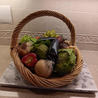 REALISTIC VEGETABLES IN A BASKET AND A GRANITE CUTTING BOARD