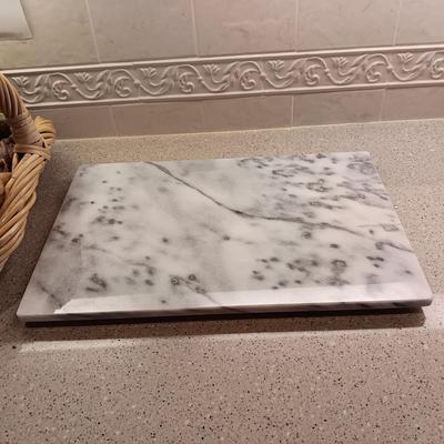REALISTIC VEGETABLES IN A BASKET AND A GRANITE CUTTING BOARD