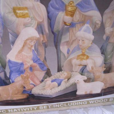New 11 piece porcelain Nativity with wood base