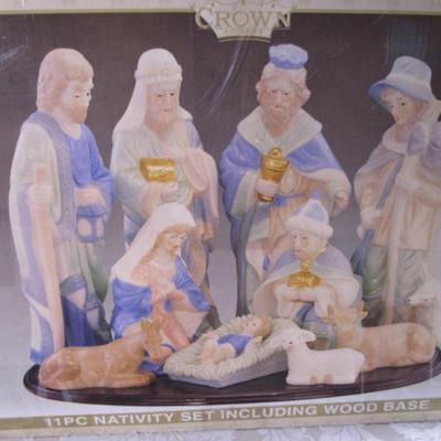New 11 piece porcelain Nativity with wood base