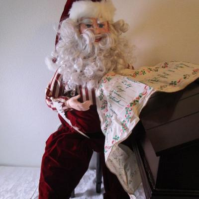 Vintage Animated porcelain "Santa Checking His List"