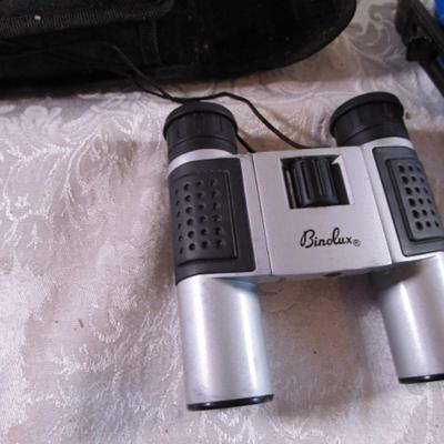 Small binoculars in case, headphones