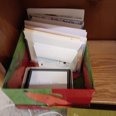 GREETING CARDS, 2 METAL FILE BOXES, VARIOUS BATTERIES, EXTENSION CORDS AND PADLOCKS