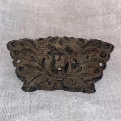 Figural Cast Iron Embossed Cherub