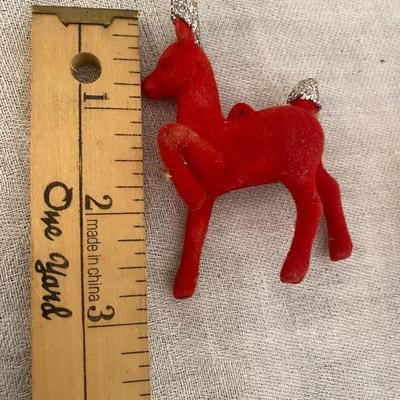 Vintage flocked reindeer.