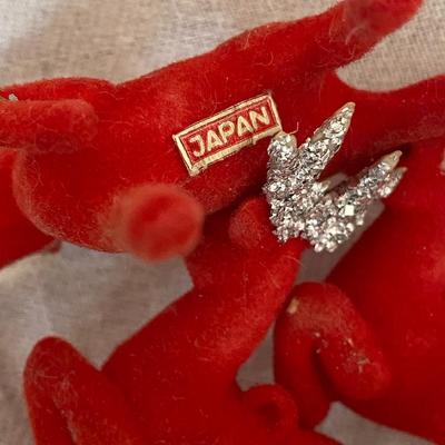 Vintage flocked reindeer.