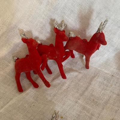 Vintage flocked reindeer.
