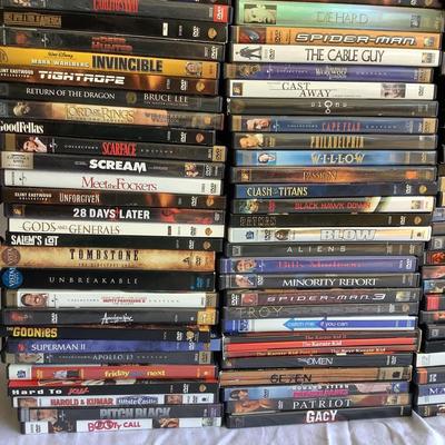 G8098 DVD Lot with 2 Metal DVD Racks