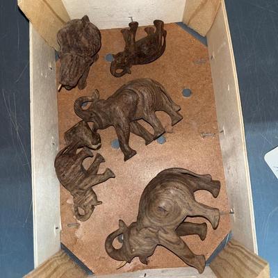 X25-small carved wooden elephants