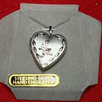 J29-hand engraved sterling silver locket