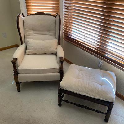UPHOLSTERED ARMCHAIR WITH OTTOMAN