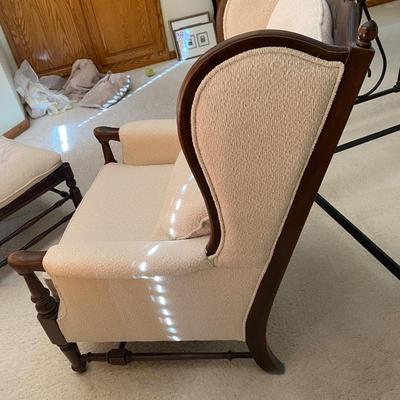 UPHOLSTERED ARMCHAIR WITH OTTOMAN