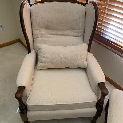 UPHOLSTERED ARMCHAIR WITH OTTOMAN