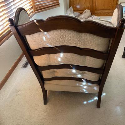 UPHOLSTERED ARMCHAIR WITH OTTOMAN