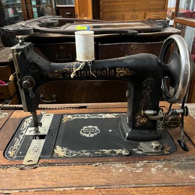 X118-antique Minnesota sewing machine
