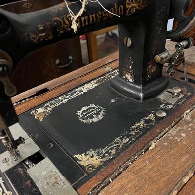 X118-antique Minnesota sewing machine