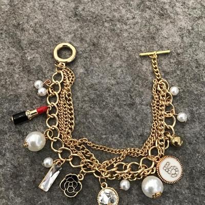Super cute, gold, toned, charm toggle bracelet