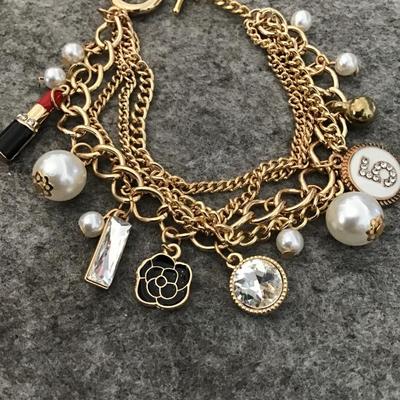 Super cute, gold, toned, charm toggle bracelet