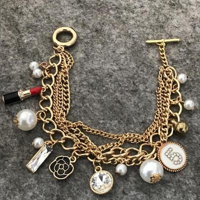 Super cute, gold, toned, charm toggle bracelet