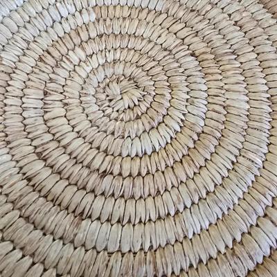 Handwoven basket and vintage needlepoint pin cushion