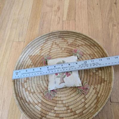 Handwoven basket and vintage needlepoint pin cushion