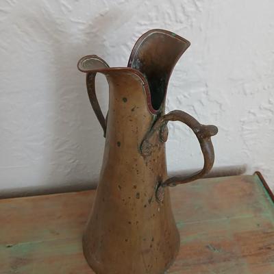 Antique Russian hammered brass copper pitcher beautiful, handcrafted aesthetic typical of Russian metalwork with two beautiful ornate...