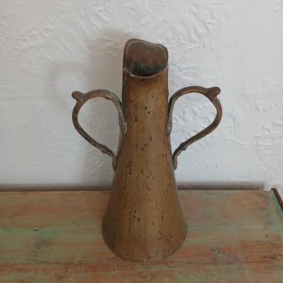 Antique Russian hammered brass copper pitcher beautiful, handcrafted aesthetic typical of Russian metalwork with two beautiful ornate...