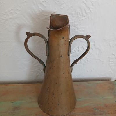 Antique Russian hammered brass copper pitcher beautiful, handcrafted aesthetic typical of Russian metalwork with two beautiful ornate...