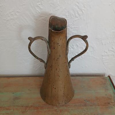 Antique Russian hammered brass copper pitcher beautiful, handcrafted aesthetic typical of Russian metalwork with two beautiful ornate...