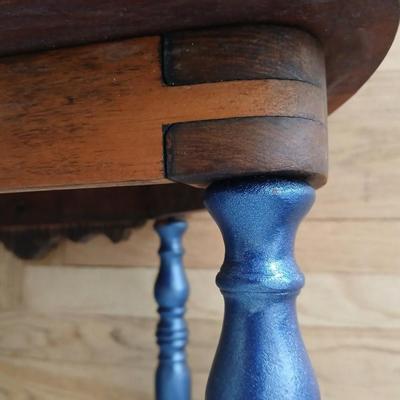 Antique half-round console table with nautical lamp