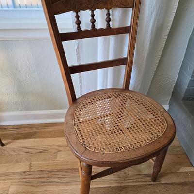 Antique side chairs - cane seats - 1 fiddle back spindle legs - one spindle back with ornate carving